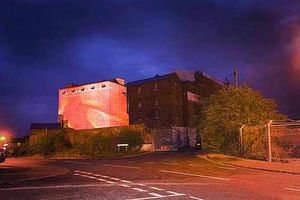 Supporting image for story: Flax Mill lit up to mark event
