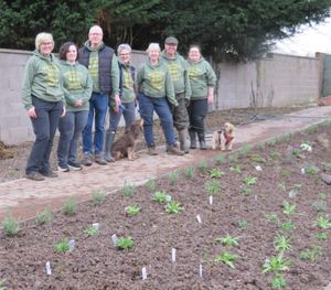 Volunteers with the newly planted alpine and rock garden