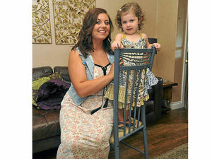 Supporting image for story: Maisie, two, rescued by firefighters after getting trapped in chair