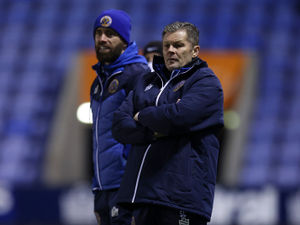 Supporting image for story: Shrewsbury Town giving all for absent boss