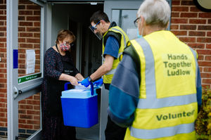 Diane Garrini with volunteer drivers Mark Mantle and Richard Pickering