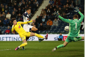 Neco Williams of Fulham and Marek Rodak of Fulham combine to block the shot from Callum Robinson of West Bromwich Albion during the Sky Bet Championship match between West Bromwich Albion and Fulham at The Hawthorns on March 15, 2022 in West Bromwich, England. (Photo by Adam Fradgley/West Bromwich Albion FC via Getty Images).
