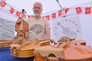 Greg Joughin with his Isle of Man violins