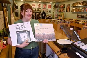 Emma Perks with three of the hot items for Record Store Day - a release by Taylor Swift, Sam Fender and Oasis too.