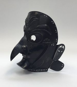 A 19th-century Japanese Somen mask from the Edo period: 1603-1868.
