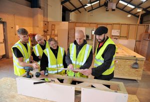 Trainees Jayden Jones, Leon Tomkinson and Simone Hitchin with Paul Wootton, a trainee supervisor, and Richard Tart, the construction tutor