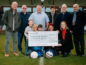 Supporting image for story: Funds raised at charity match