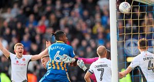 Omar Beckles is in action against rivals Walsall (AMA)