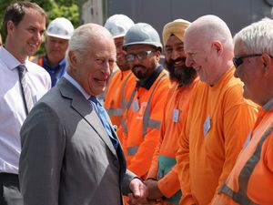 Supporting image for story: King jokes with workers during visit to London’s super sewer