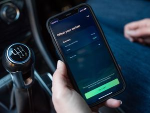 Supporting image for story: Free smartphone app lets drivers offset tailpipe emissions in real-time