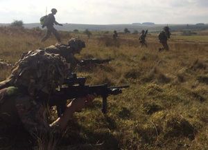 Troops advance under covering fire