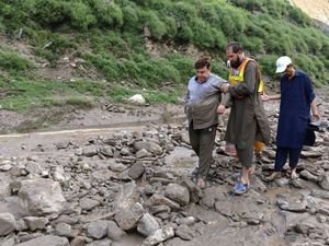 Supporting image for story: Flash floods sweep away vehicles carrying tourists in northern Pakistan