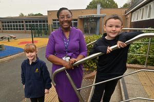 Headteacher Fiona Atherton with pupils Gracie-Mae and Dexter 