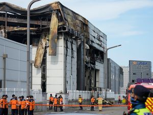 Supporting image for story: South Korean investigators search factory ruins after fire kills 23