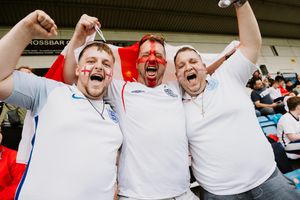 Harry Smith, Chris Smith and Mike Smith watch on the big screen at the New Bucks Head in Telford