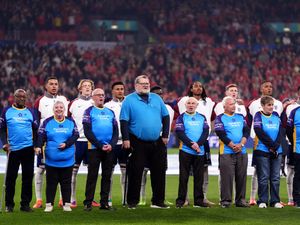 Supporting image for story: Football fans with dementia walk out with players for England-Wales match