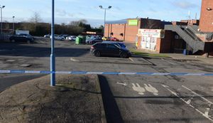 Police cordoned off the car park