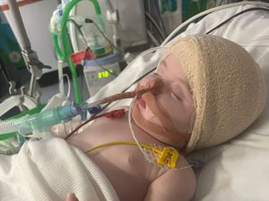 Supporting image for story: Baby diagnosed with brain tumour at three months enjoys first birthday at home