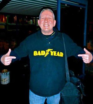 Wayne wearing 'Badyear' uniform created by staff following closure announcement