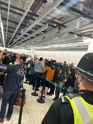 Images show grows of holiday makers forming at Birmingham Airport as the security gates are hit by 'technical issues'