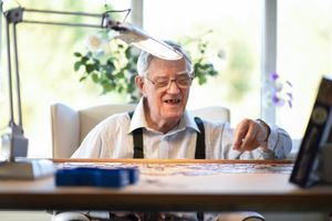 William Littley enjoys spending time piecing together a jigsaw at Barclay Gardens care home in Telford