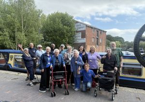 Caption: Joy expressed on the occasion of the first joint Radfield Home Care and Shrewsbury Severn Rotary Club canal boat trip for local citizens.