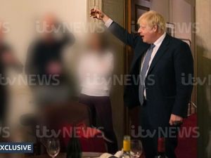 Supporting image for story: Pictures show Boris Johnson raising glass during lockdown leaving party