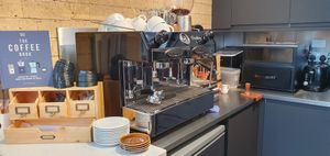 You'll hear the bubbling of the coffee machines on entry