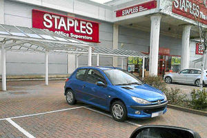 A Peugeot in the car park at Staples in Harlescott, Shrewsbury