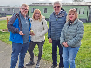 Mark and Dawn Beech from Let's Glamp Retro and Andre and Alison Gallagher from Nannerth Fawr Farm playing the new interactive game at Meadow Springs
