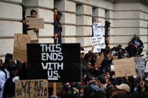 People watched on as the rally gathered in Centenary Square
