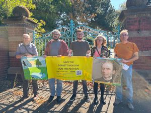 Descendants of John Corbett in front of the old Corbett Hospital gates in Amblecote