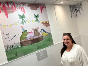 Shrewsbury artist Alice Turner with artwork at the Telford Centre