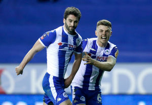 Will Grigg (left) celebrate (Martin Rickett/PA Wire)