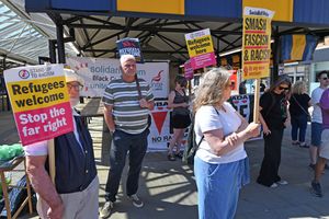 The counter protest saw placards with anti-racism messages