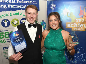 Dyffryn Tanat YFC Club Chair Sion Evans and former Club Chair Elin Lewis with their trophy