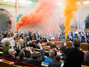 MPs protest with flares at the Hungarian parliament