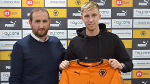 Ben Stevenson pictured with sporting director Kevin Thelwell (pic courtesy of Wolves)