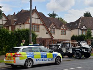Supporting image for story: Neighbours speak of shock after car rams gates and shots fired at house on edge of Wolverhampton
