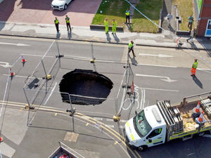 Supporting image for story: Walsall road closed as huge sinkhole opens up