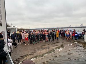More than 40 swimmers braved the icy water to take part in the swim