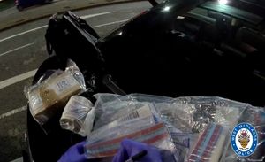 The drugs and cash seized by officers. 