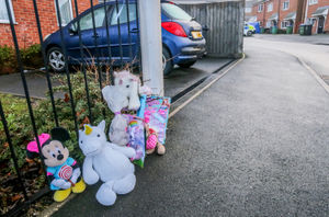 Police and tributes in Robin Close, Rowley Regis