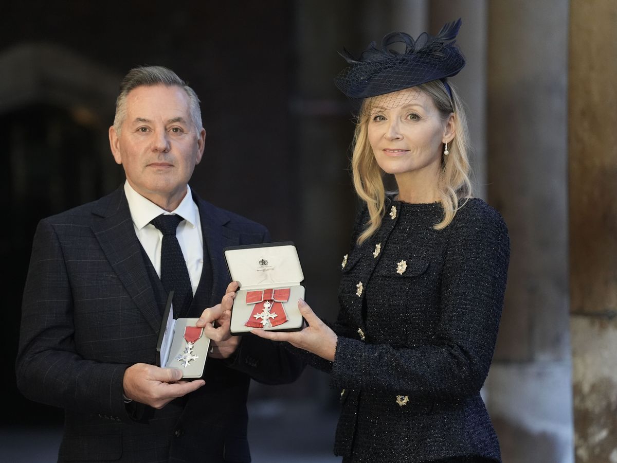 Cancer charity leaders and Royal Navy officer honoured at &lsquo;extraordinary&rsquo; palace