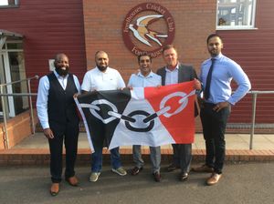 Councillor Paul Singh, centre, with the Black Country flag