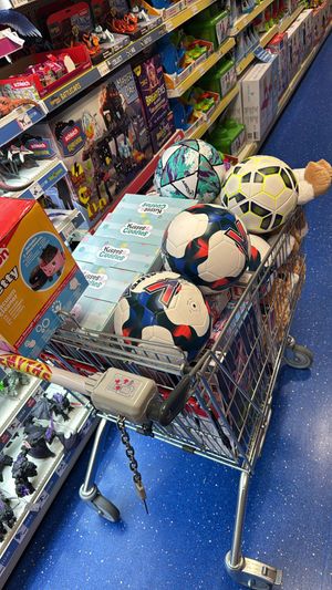 Shopping trolley with donated gifts.