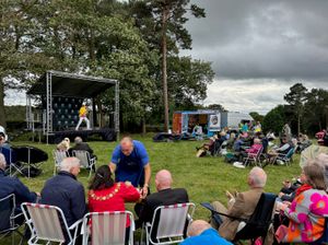 Veterans enjoy a Freddie Mercury tribute. 