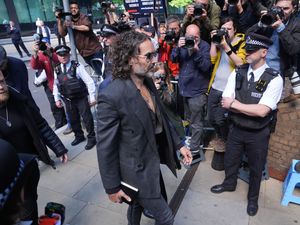 Supporting image for story: Comedian Russell Brand to enter pleas to rape and sexual assault charges