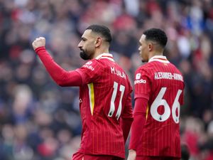 Mohamed Salah celebrates scoring for Liverpool against Wolves