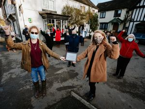 Supporting image for story: Village volunteers recognised with plaque for lockdown work